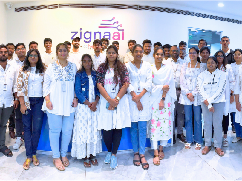 ZignaAI team members pose for a group photo in the former ZignaAI office